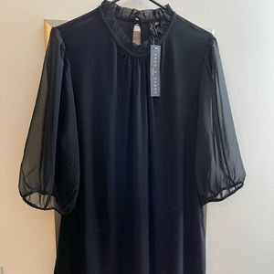 Beautiful high neck black blouse with sheer sleeves. Very Wednesday Addams